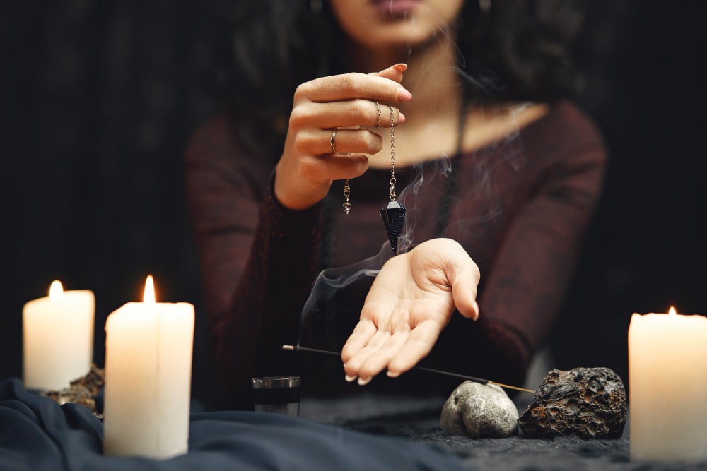 girl-using-pendulum-for-spiritual-practices