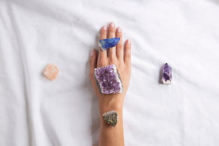 hand-wearing-crystals